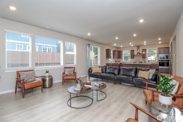 16321 SE 133rd Pl, Renton, WA 98059 - living room with light wood-style flooring and recessed lighting