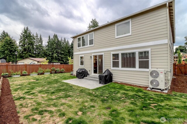 16321 SE 133rd Pl, Renton, WA 98059 - rear view of property with a fenced backyard, entry steps, and a patio