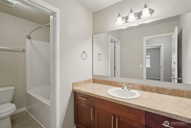 14403 Lockwood Ln SE, Yelm, WA 98597 - bathroom featuring vanity, shower / bath combination, and tile patterned floors
