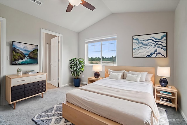 14403 Lockwood Ln SE, Yelm, WA 98597 - bedroom featuring light colored carpet, vaulted ceiling, and ceiling fan
