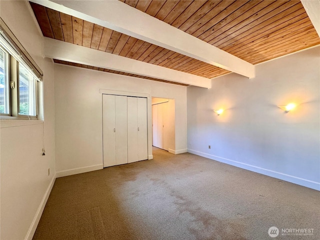110 E Rhododendron Ln, Union, WA 98592 - unfurnished bedroom featuring carpet flooring and a wood ceiling with exposed beams