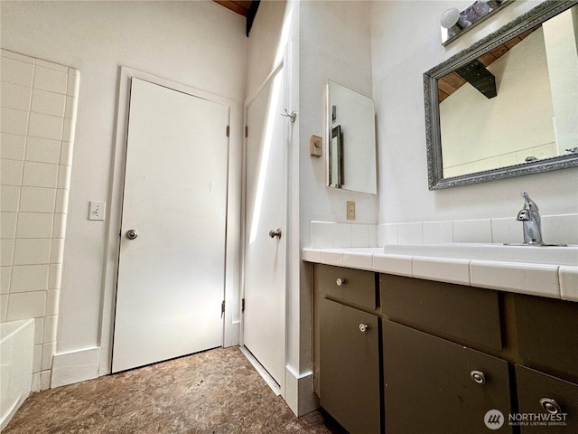 110 E Rhododendron Ln, Union, WA 98592 - bathroom with vanity and stone finish flooring