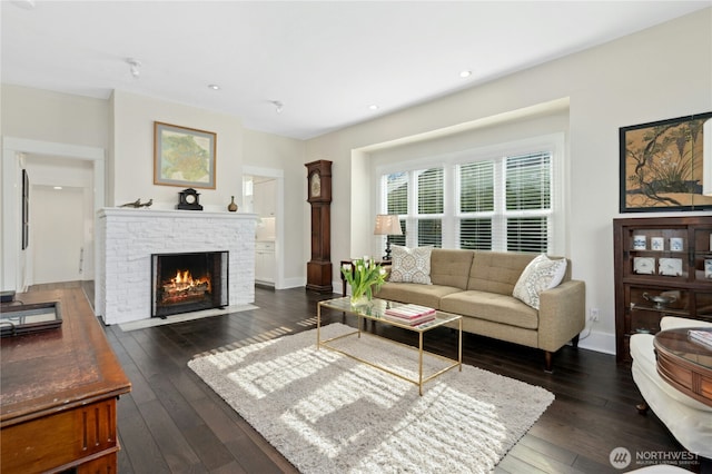 3232 37th Ave S, Seattle, WA 98144 - living room featuring dark wood-style flooring, a brick fireplace, and recessed lighting