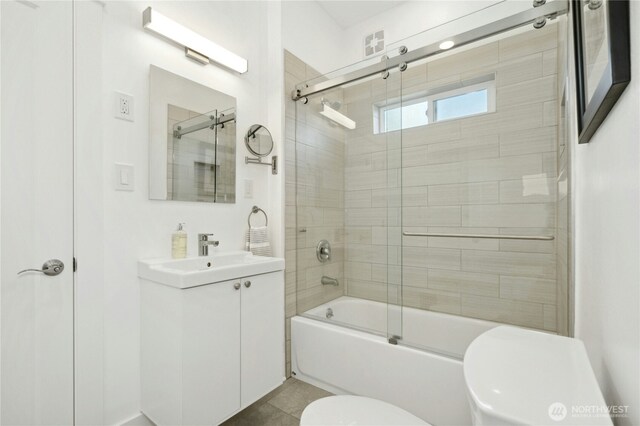 3232 37th Ave S, Seattle, WA 98144 - full bath featuring shower / bath combination with glass door, vanity, and tile patterned flooring