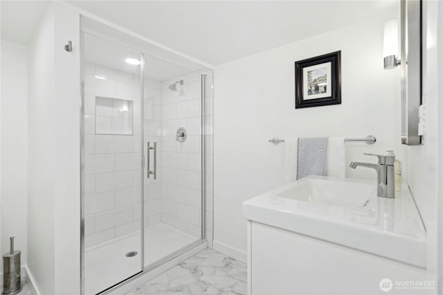 3232 37th Ave S, Seattle, WA 98144 - bathroom with marble look tile flooring, a stall shower, and vanity