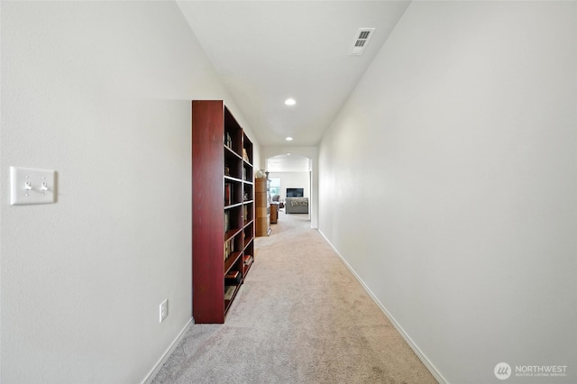 532 SW Alicia Loop, College Place, WA 99324 - hallway with arched walkways, light colored carpet, and recessed lighting