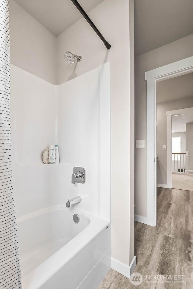 16204 SE 133rd Pl Unit 101, Renton, WA 98059 - bathroom with  shower combination and wood finished floors