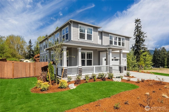 16204 SE 133rd Pl Unit 101, Renton, WA 98059 - view of front of home with covered porch, concrete driveway, and a garage