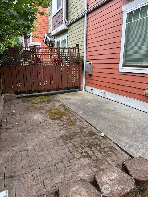 6829 Weedin Pl NE, Seattle, WA 98115 - view of patio with a gate