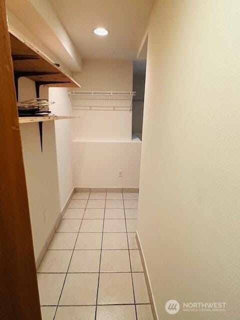 6829 Weedin Pl NE, Seattle, WA 98115 - walk in closet with light tile patterned floors