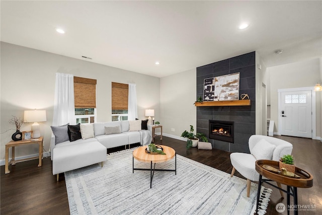 814 9th St SW, Puyallup, WA 98371 - living room with wood finished floors, a fireplace, and recessed lighting