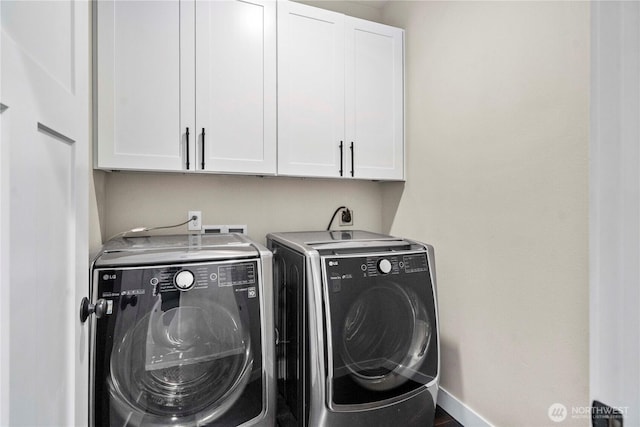 814 9th St SW, Puyallup, WA 98371 - laundry room featuring washing machine and dryer and cabinet space