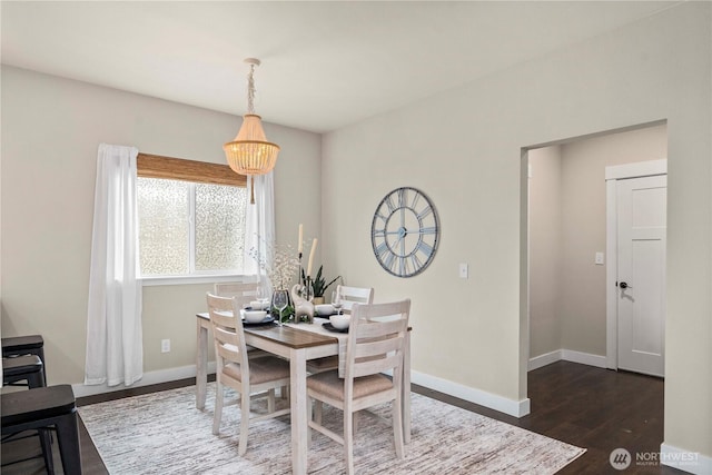 814 9th St SW, Puyallup, WA 98371 - dining room with baseboards and dark wood finished floors