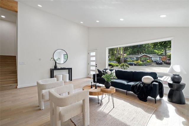 13652 99th Ave NE, Kirkland, WA 98034 - living area with stairway, light wood-style floors, recessed lighting, and high vaulted ceiling