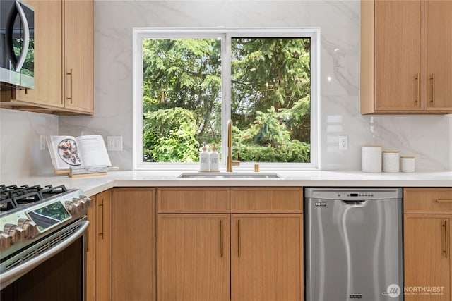 13652 99th Ave NE, Kirkland, WA 98034 - kitchen with stainless steel appliances, light countertops, and backsplash
