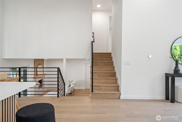 13652 99th Ave NE, Kirkland, WA 98034 - staircase featuring wood finished floors and recessed lighting