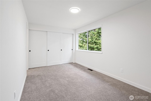 13652 99th Ave NE, Kirkland, WA 98034 - unfurnished bedroom with carpet and a closet