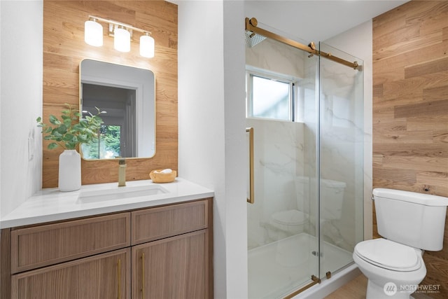 13652 99th Ave NE, Kirkland, WA 98034 - full bathroom featuring a marble finish shower, vanity, and wooden walls