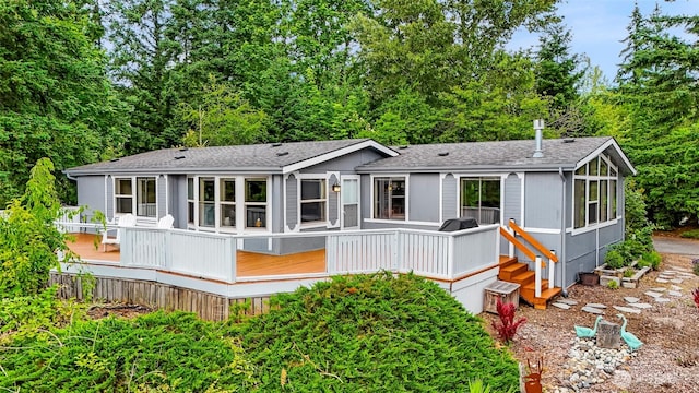 2366 Northshore Rd, Bellingham, WA 98226 - rear view of house with roof with shingles and a deck