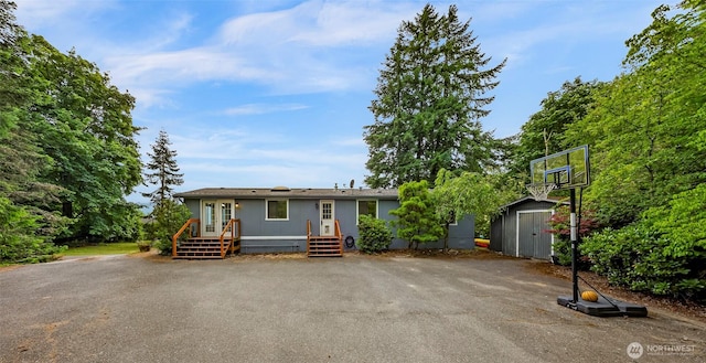 2366 Northshore Rd, Bellingham, WA 98226 - view of front facade featuring a shed and french doors