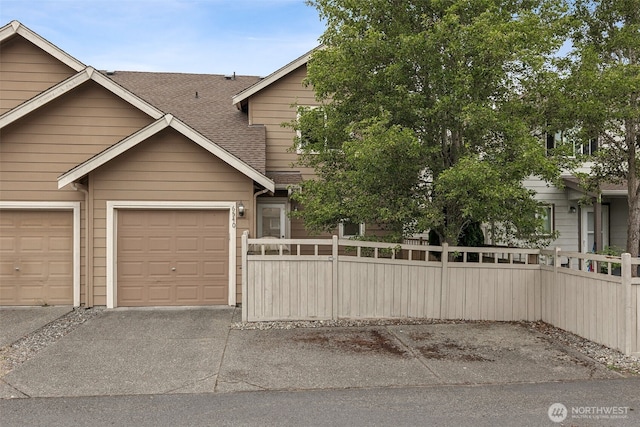 6540 Indiana St SE, Olympia, WA 98513 - view of front of house featuring a shingled roof and driveway