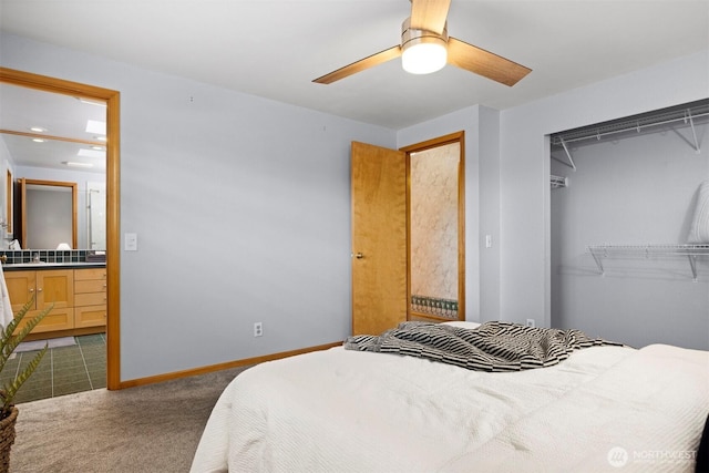 347 W King Tut Rd, Bellingham, WA 98226 - bedroom with dark carpet, ensuite bathroom, a closet, and ceiling fan