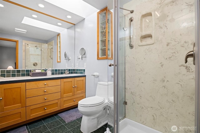 347 W King Tut Rd, Bellingham, WA 98226 - full bath featuring double vanity, a stall shower, tile patterned floors, and recessed lighting