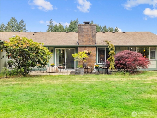 3300 Carpenter Rd SE Unit 49, Lacey, WA 98503 - back of property featuring a chimney, a lawn, and a patio area