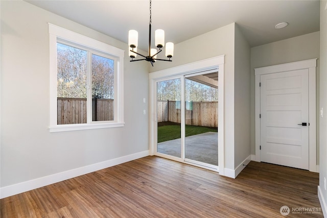 2630LOT12 Sievers Way, Ferndale, WA 98248 - unfurnished dining area featuring a chandelier and wood finished floors