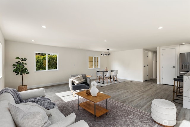 7605 20th Ave E, Tacoma, WA 98404 - living room featuring light wood-type flooring and recessed lighting
