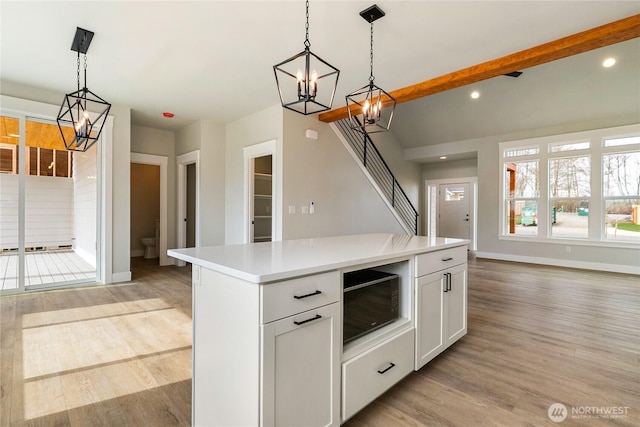 2632LOT13 Sievers Way, Ferndale, WA 98248 - kitchen with a chandelier, black microwave, light wood-type flooring, light countertops, and recessed lighting