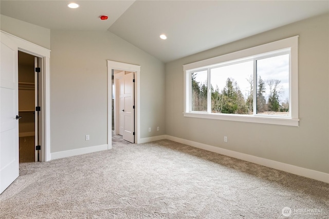 2632LOT13 Sievers Way, Ferndale, WA 98248 - unfurnished bedroom featuring lofted ceiling, carpet floors, recessed lighting, and a spacious closet