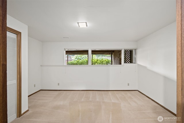 3015 44th Ave W, Seattle, WA 98199 - unfurnished room with carpet flooring and baseboards