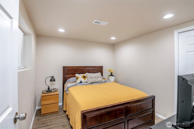 110 S 198th Pl, Des Moines, WA 98148 - bedroom with light wood finished floors and recessed lighting