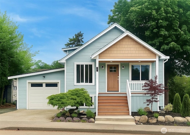 746 N 88th St, Seattle, WA 98103 - view of front facade with a porch, driveway, and a garage