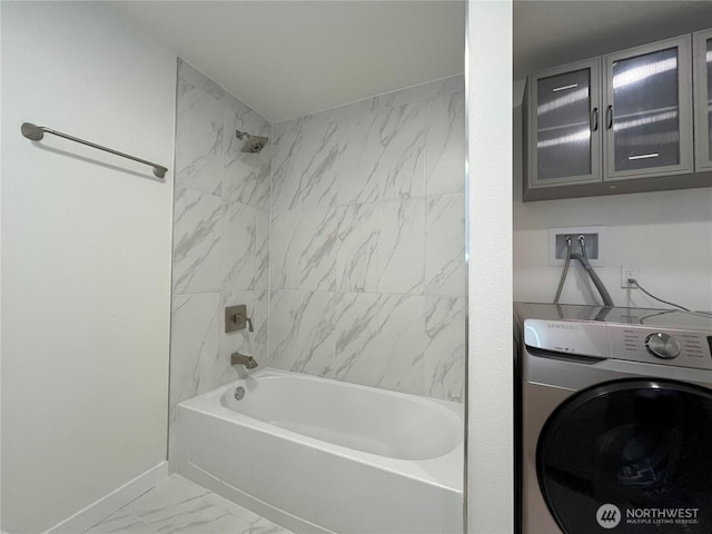 746 N 88th St, Seattle, WA 98103 - bathroom with washer / dryer, marble finish flooring, and shower / bath combination