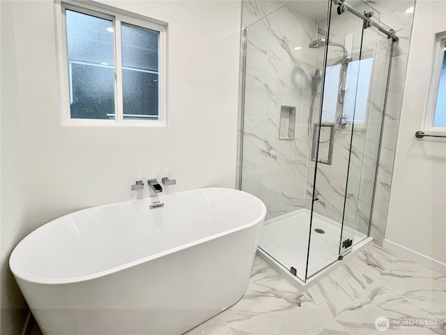 746 N 88th St, Seattle, WA 98103 - bathroom featuring marble finish floors, a freestanding bath, and a marble finish shower