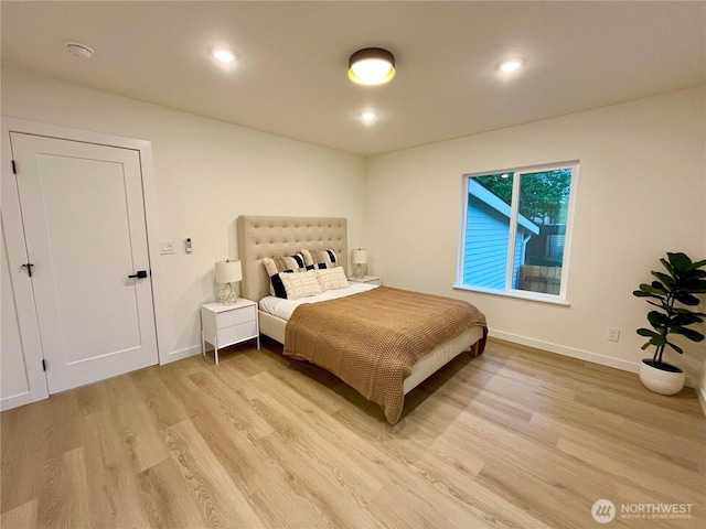 746 N 88th St, Seattle, WA 98103 - bedroom with light wood-style flooring and recessed lighting