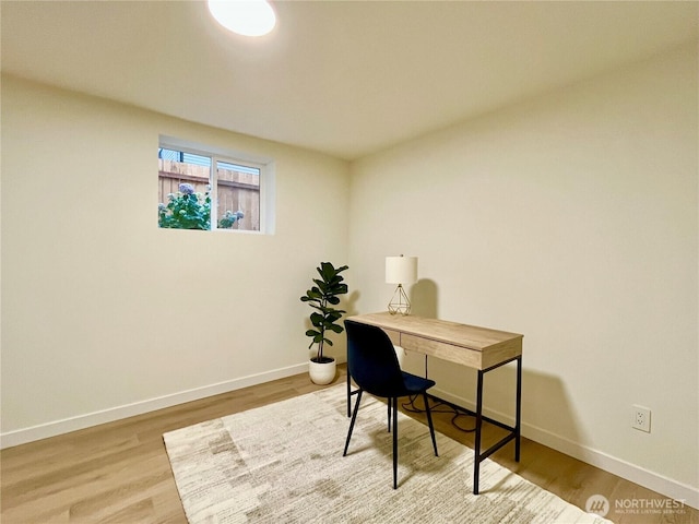 746 N 88th St, Seattle, WA 98103 - home office with baseboards and wood finished floors