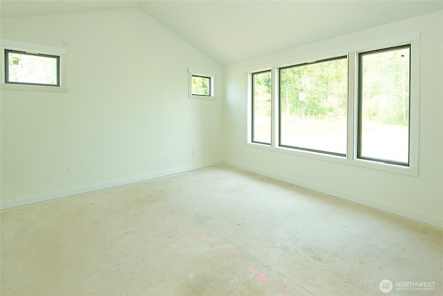 12107 Mundy Loss Rd E, Buckley, WA 98321 - empty room featuring vaulted ceiling and plenty of natural light