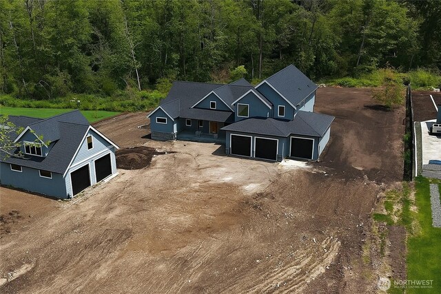 12107 Mundy Loss Rd E, Buckley, WA 98321 - aerial view of property and surrounding area featuring a heavily wooded area