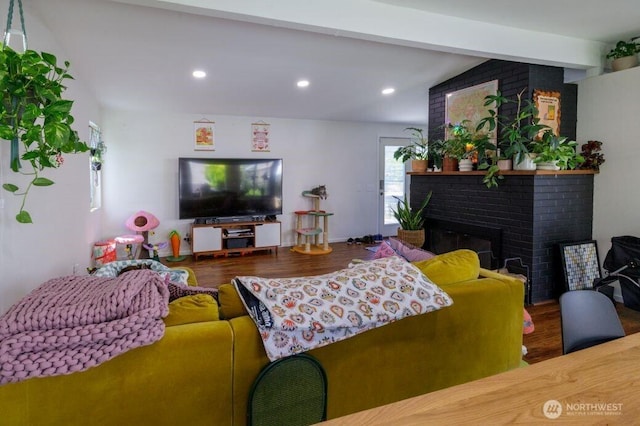 133 Thomas St NW, Olympia, WA 98502 - living area featuring wood finished floors, a fireplace, and recessed lighting
