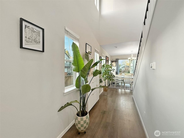 12102 SE 314th Pl, Auburn, WA 98092 - hallway featuring a chandelier and wood finished floors