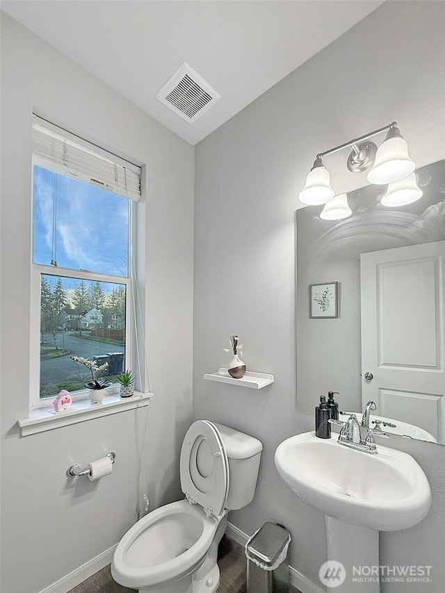 12102 SE 314th Pl, Auburn, WA 98092 - bathroom featuring baseboards and toilet