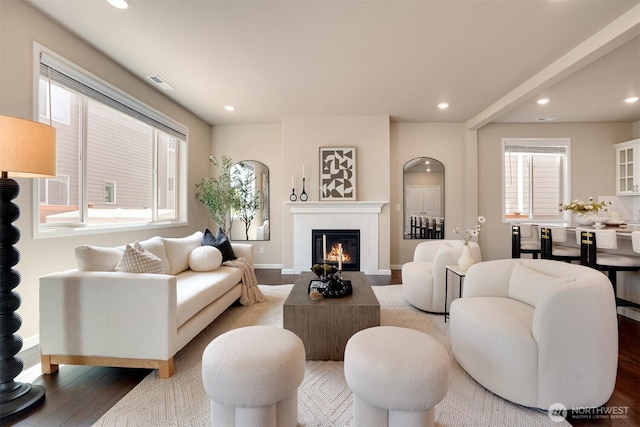 4418 233rd Pl SE, Bothell, WA 98021 - living room featuring wood finished floors, plenty of natural light, recessed lighting, and a glass covered fireplace
