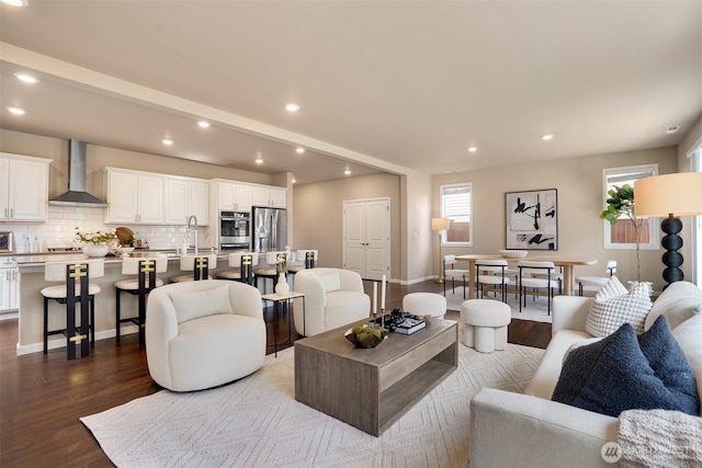 4418 233rd Pl SE, Bothell, WA 98021 - living room with healthy amount of natural light, dark wood-style floors, and recessed lighting