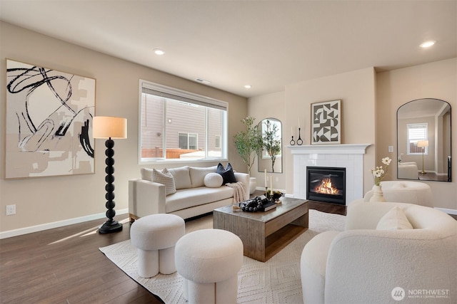 4418 233rd Pl SE, Bothell, WA 98021 - living room with wood finished floors, a tiled fireplace, and recessed lighting
