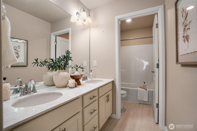 4418 233rd Pl SE, Bothell, WA 98021 - full bathroom with double vanity and tub / shower combination