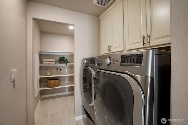 4418 233rd Pl SE, Bothell, WA 98021 - laundry area featuring cabinet space and washer and dryer