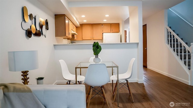315E Park St Unit A22, North Bend, WA 98045 - dining room featuring dark wood-style flooring, stairs, and recessed lighting